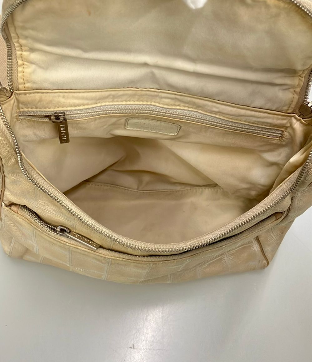 chanel beige backpack accessories included