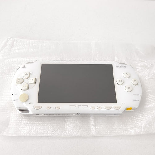 sony psp-1000 handheld console front view