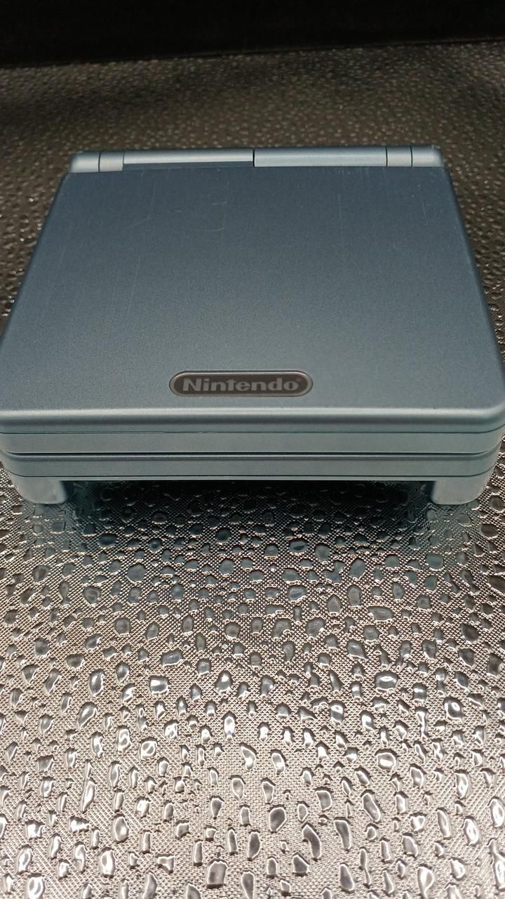 nintendo ags-001 handheld console accessories included