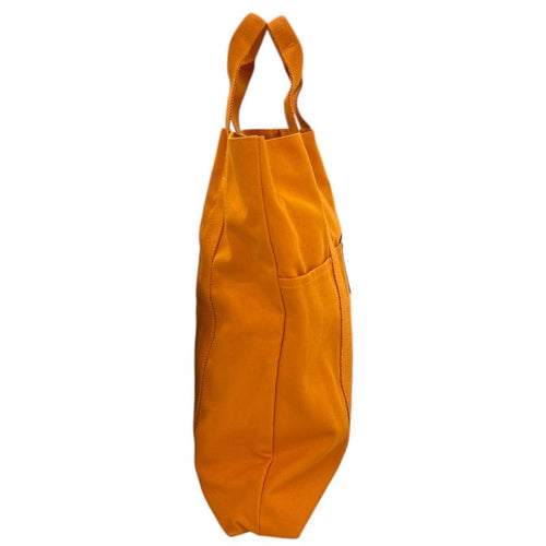 hermes orange tote bag side view