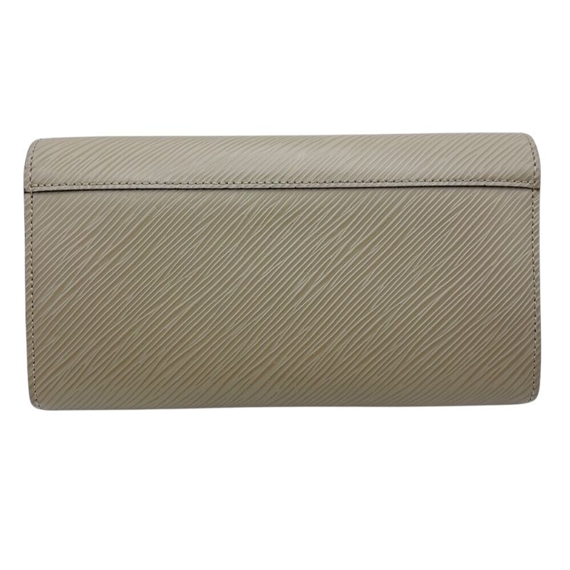 louis vuitton m67510 beige wallet front view