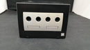 nintendo dol-001 video game console front view