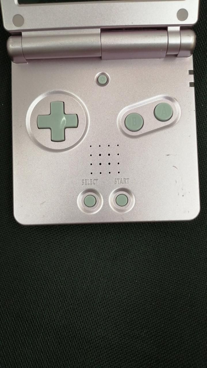 nintendo ags-001 handheld console rear view