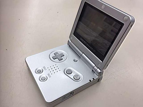 nintendo ags-001 handheld console side view