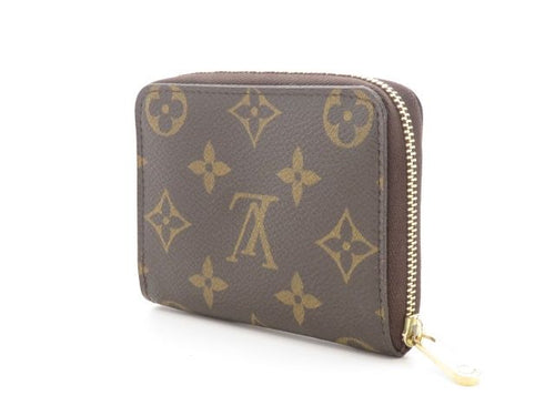 louis vuitton m60067 coin purse front view