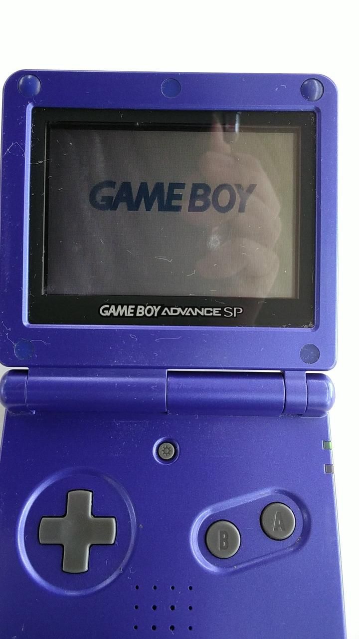 nintendo ags-001 handheld console condition details