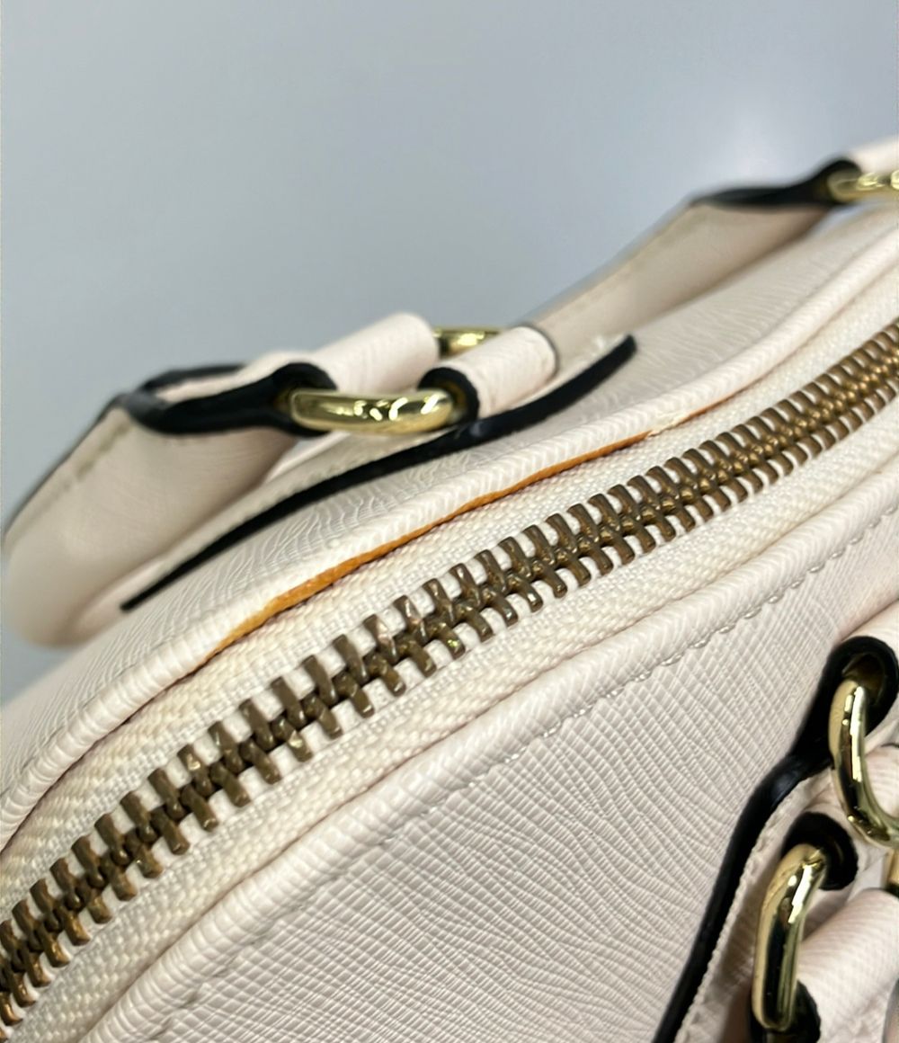 & chouette beige shoulder bag interior details