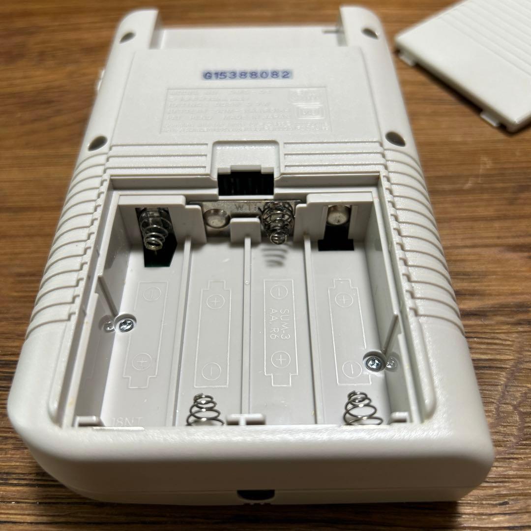 nintendo dmg-01 handheld console accessories included