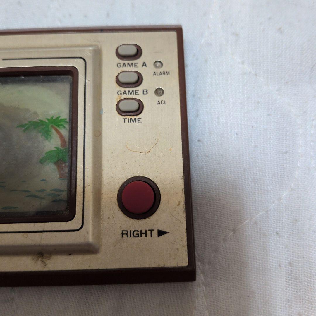 nintendo pr-21 handheld electronic game side view