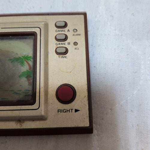 nintendo pr-21 handheld electronic game side view