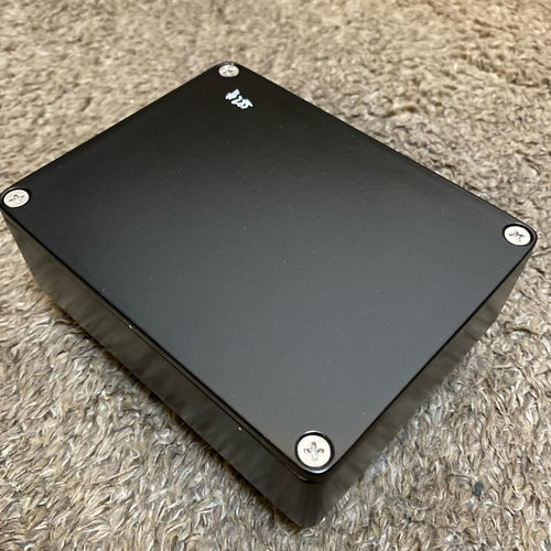 black guitar effector rear view
