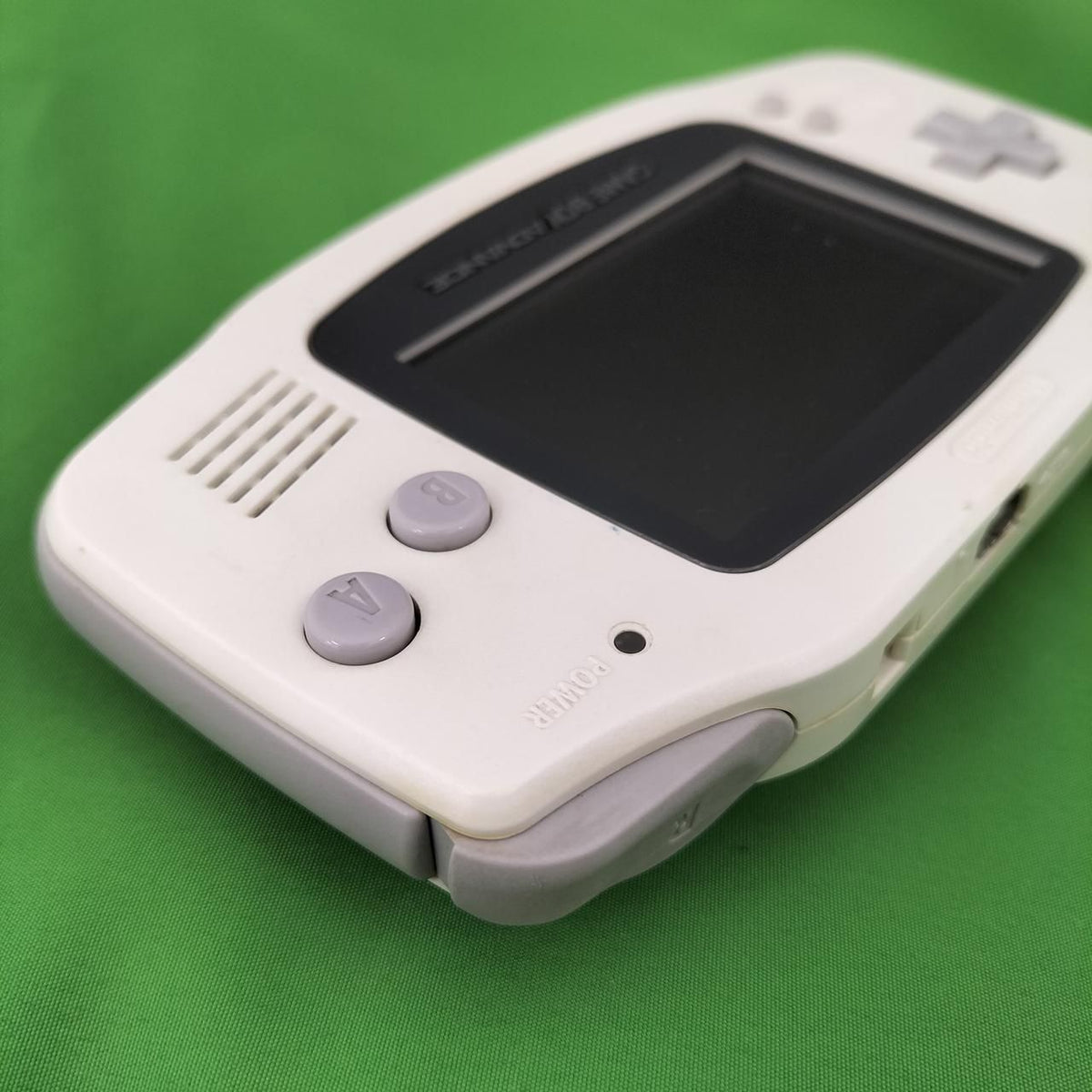 nintendo agb-001 handheld console markings and labels