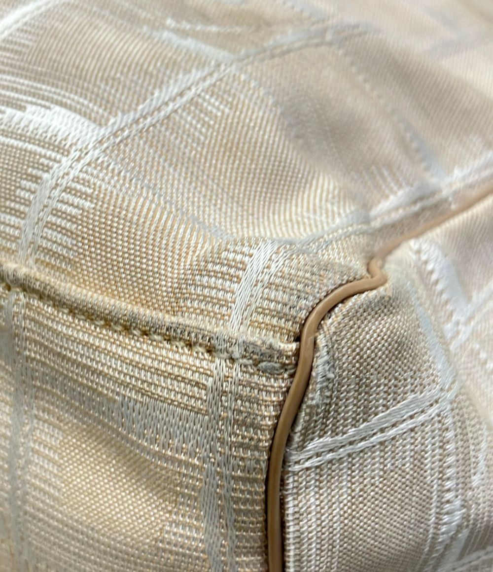 chanel beige backpack interior details