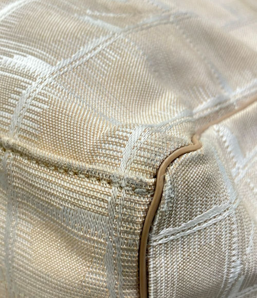 chanel beige backpack interior details