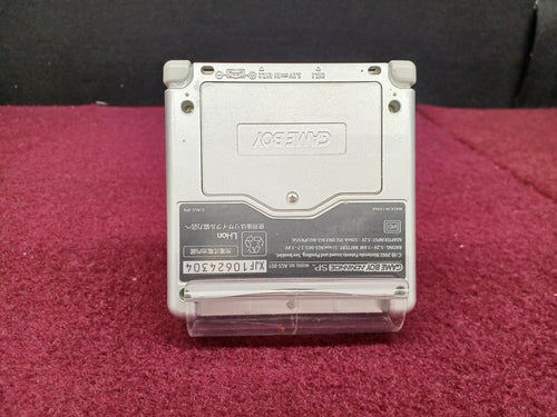 nintendo ags-001 handheld console front view