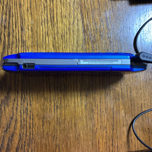 sony psp-3000 handheld console front view