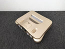 nintendo nus-001 gold video game console side view