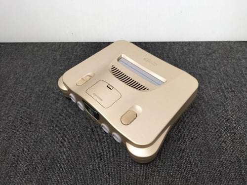 nintendo nus-001 gold video game console side view