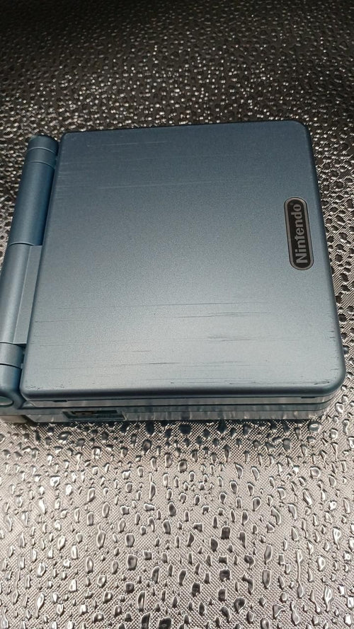 nintendo ags-001 handheld console front view