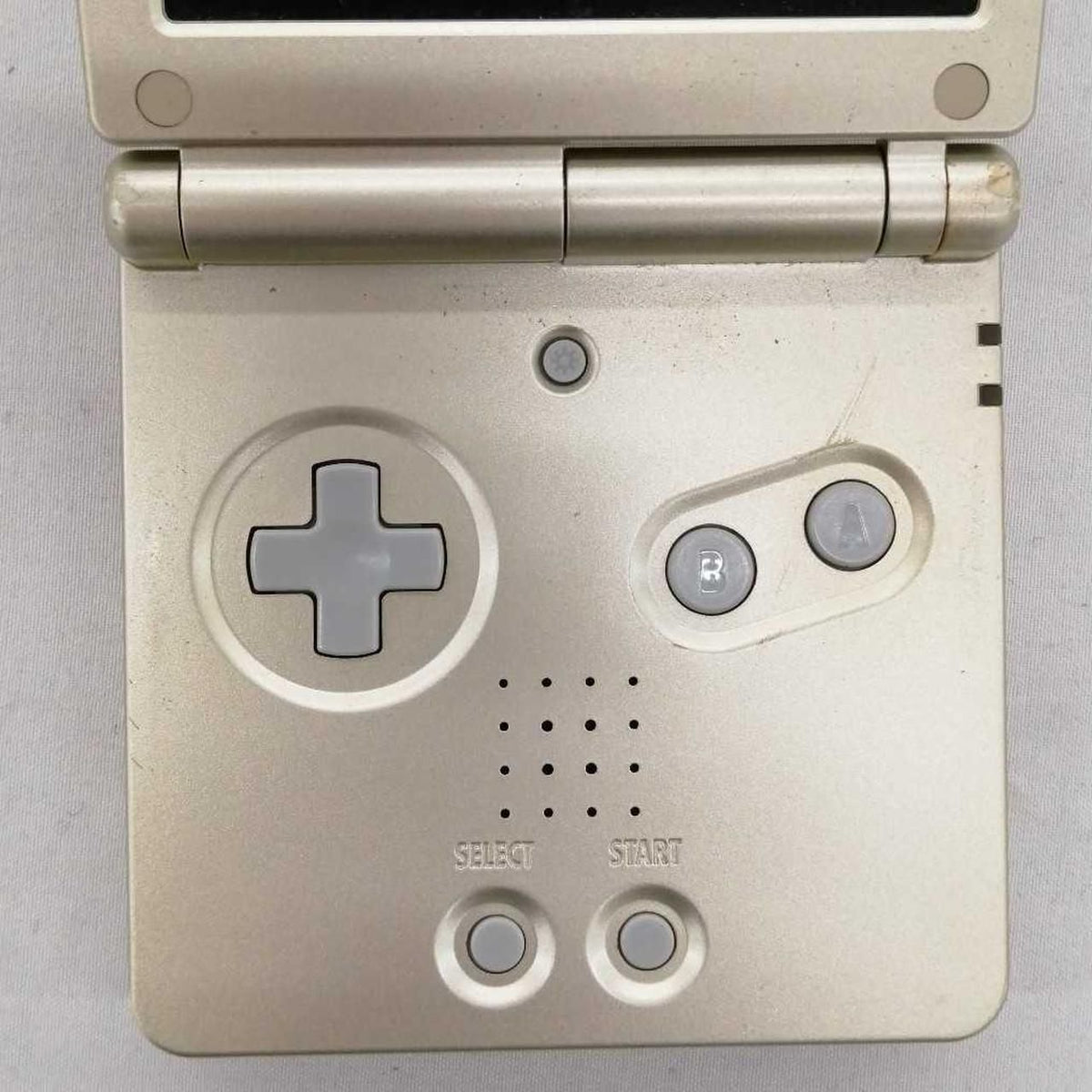 nintendo ags-001 handheld console front view