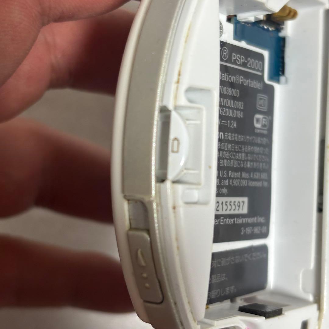sony psp-2000 handheld console side view