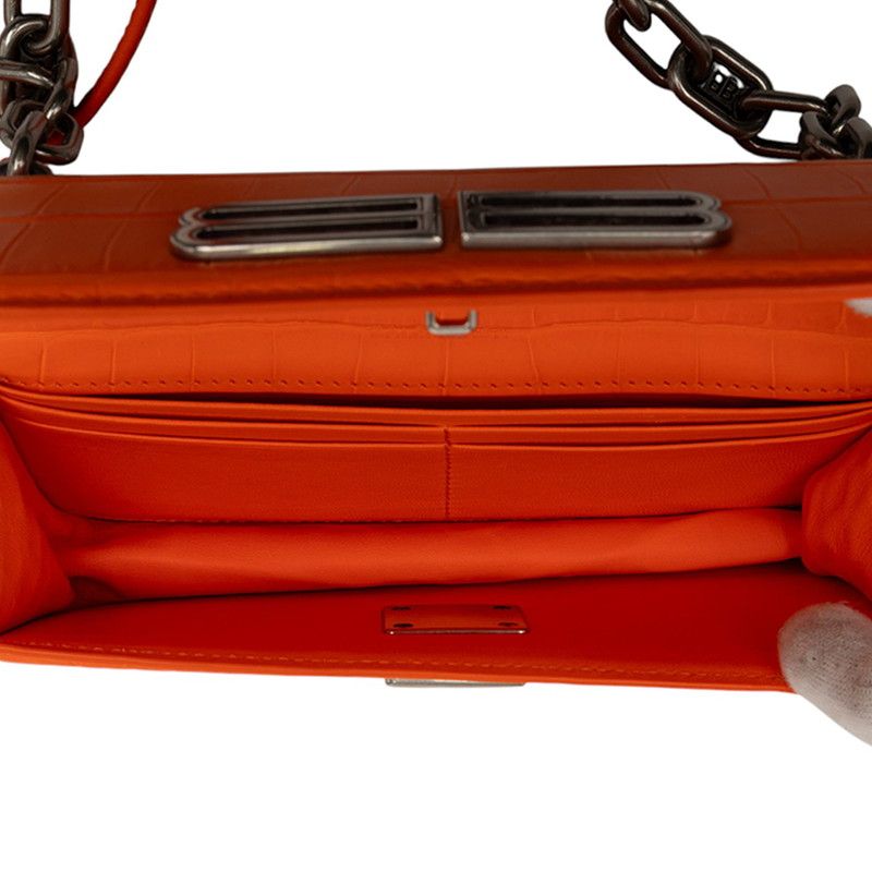 balenciaga orange shoulder bag side view