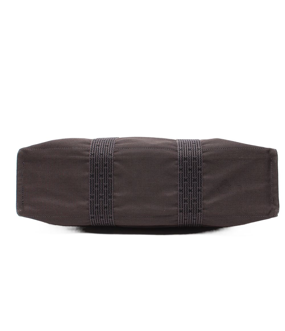 hermes grey tote bag side view