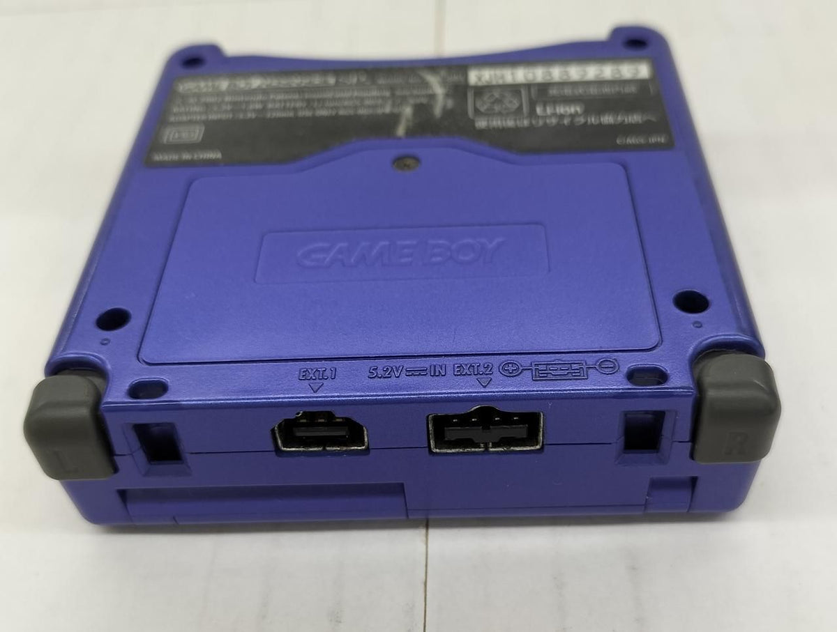 nintendo ags-001 handheld console side view