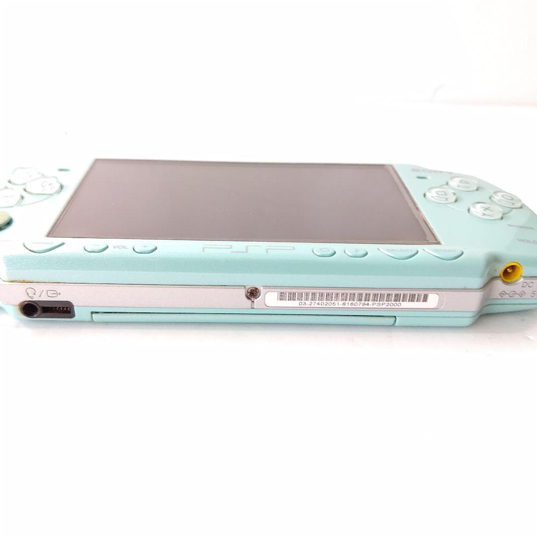 sony psp-2000 handheld console side view