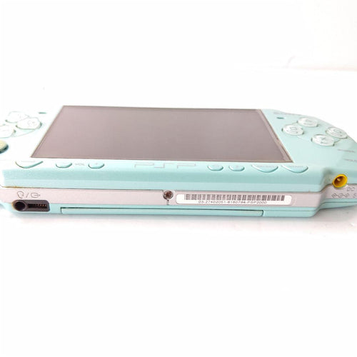 sony psp-2000 handheld console side view