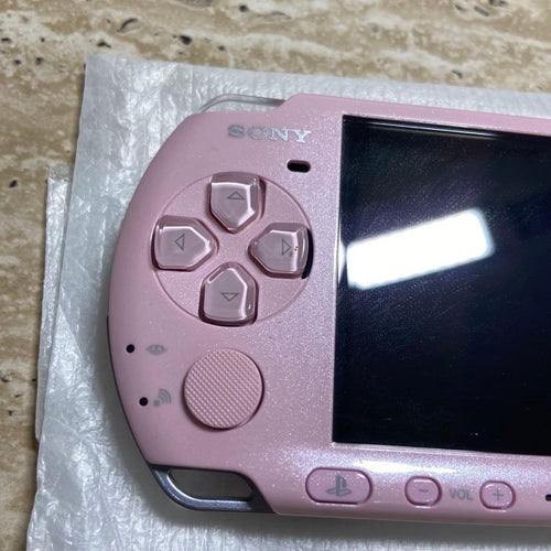 sony psp-3000 pink handheld console side view