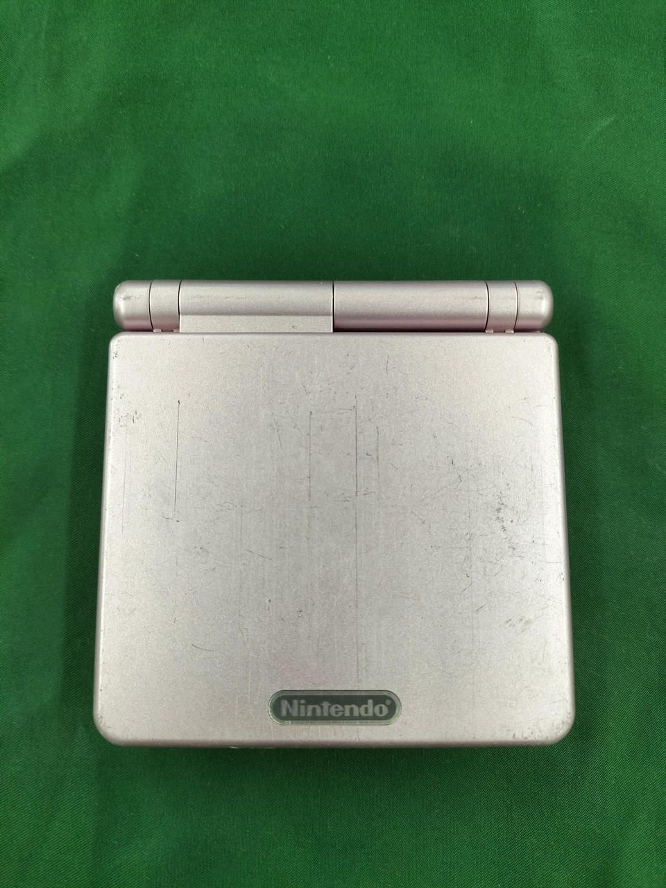 nintendo ags-001 handheld console front view
