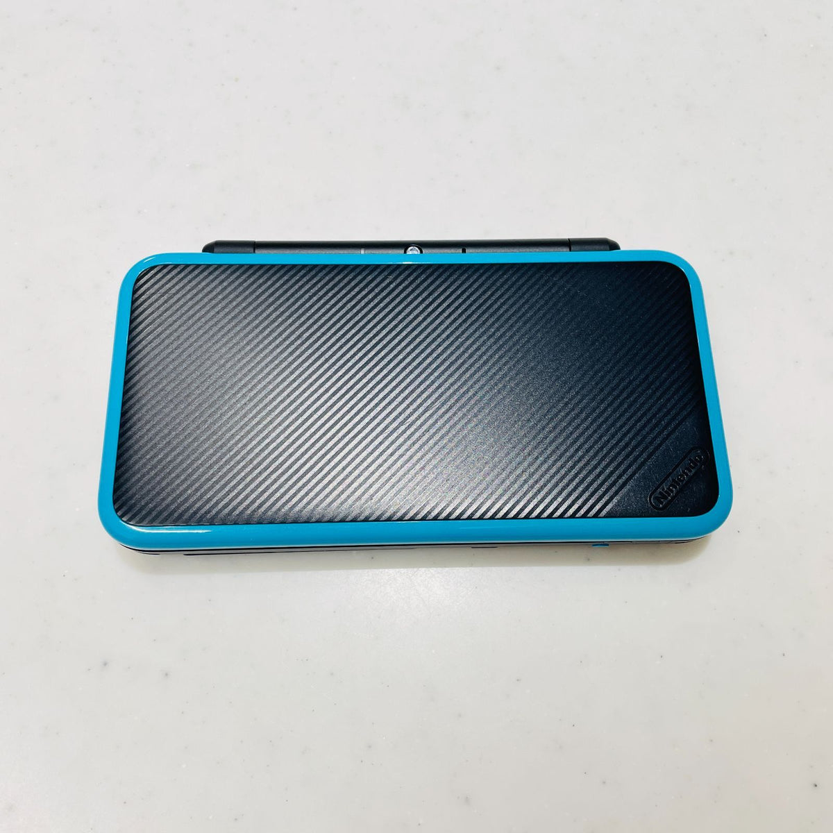 nintendo jan-001 handheld console rear view