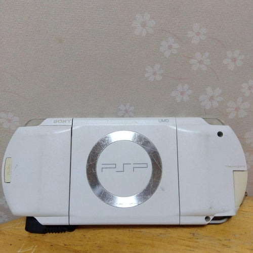 sony psp-1000 white handheld console front view