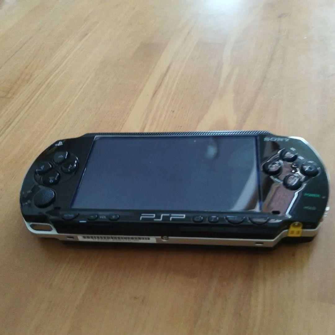 sony psp-1000 handheld console front view