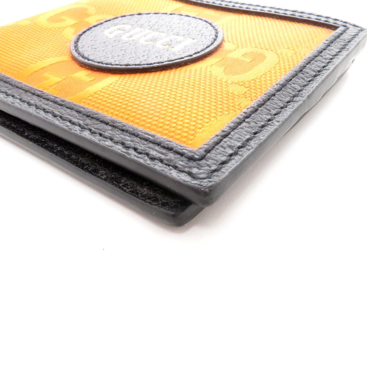 gucci 625573-h9han orange wallet side view