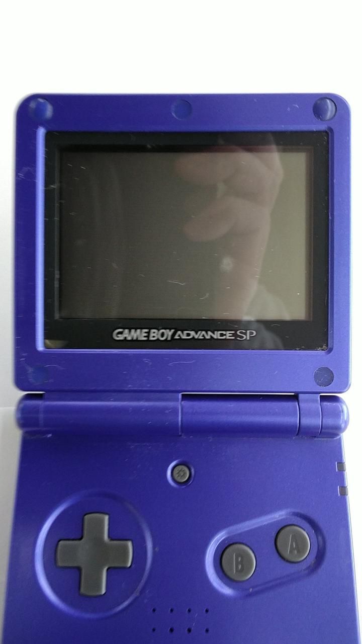 nintendo ags-001 handheld console rear view