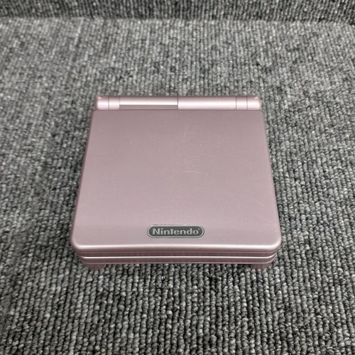 nintendo ags-001 handheld console side view