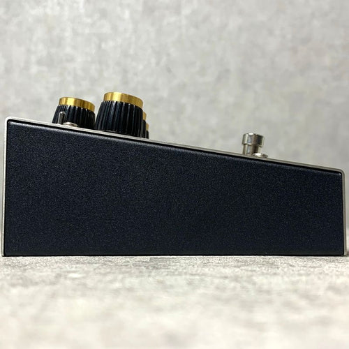 grey guitar effector side view