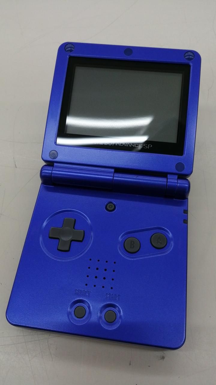 nintendo ags-001 handheld console front view
