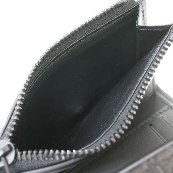 louis vuitton m12635 wallet side view