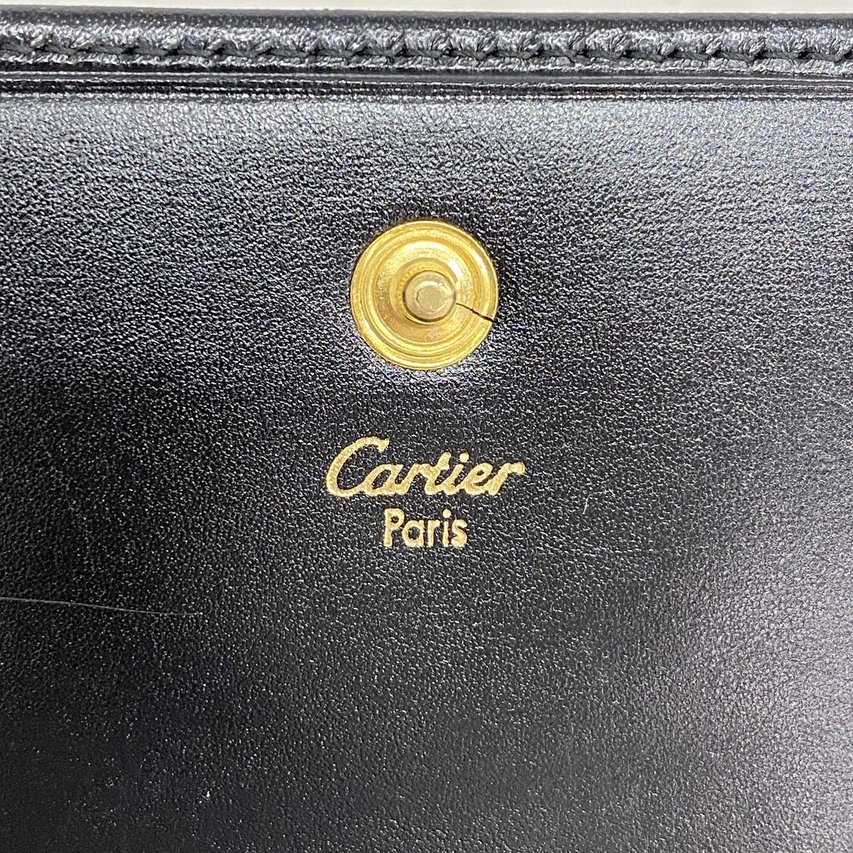 cartier coin purse side view