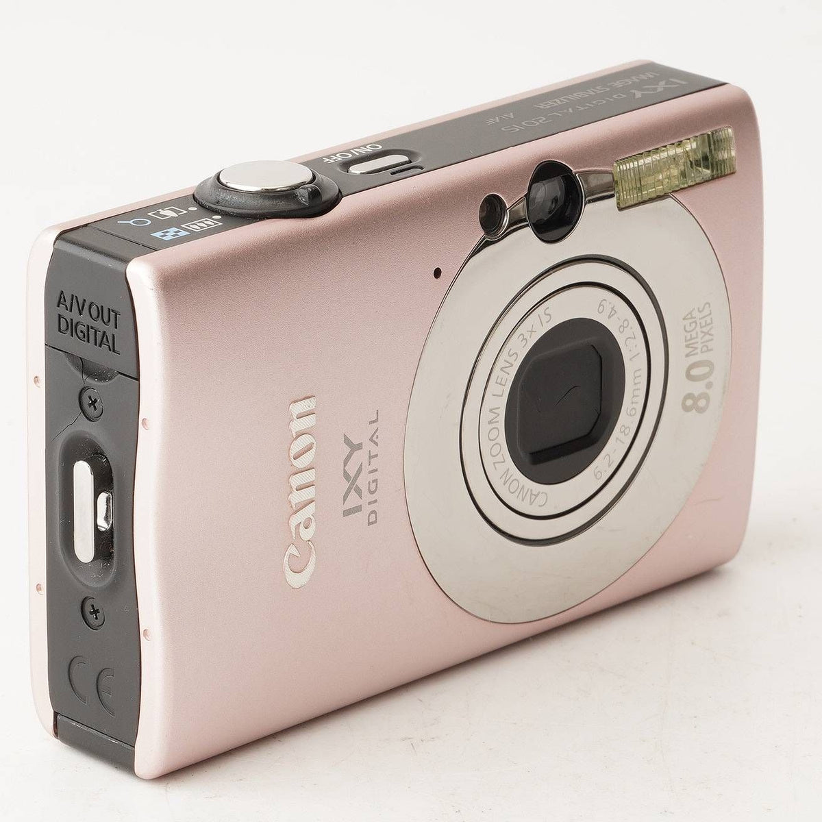 canon pink compact digital camera rear view