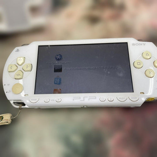sony psp-1000 handheld console front view