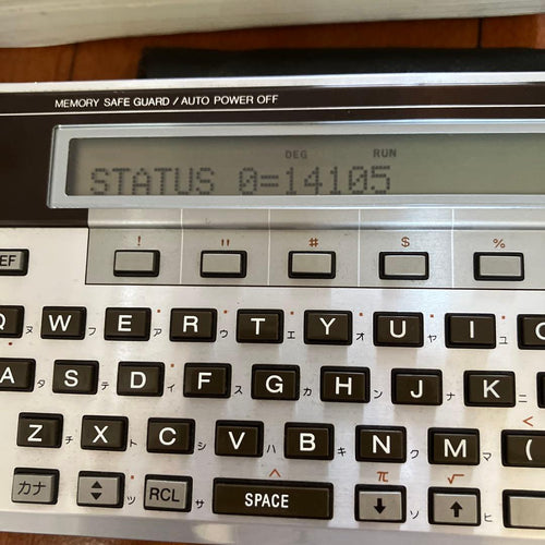 sharp pc-1501 pocket computer / calculator rear view