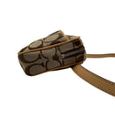 coach beige shoulder bag front view
