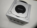 nintendo dol-001 video game console front view