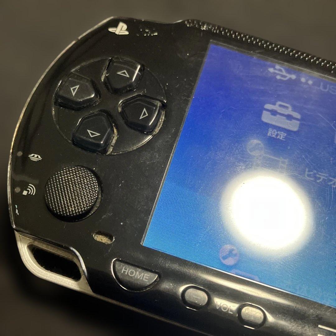 sony psp-1000 handheld console front view