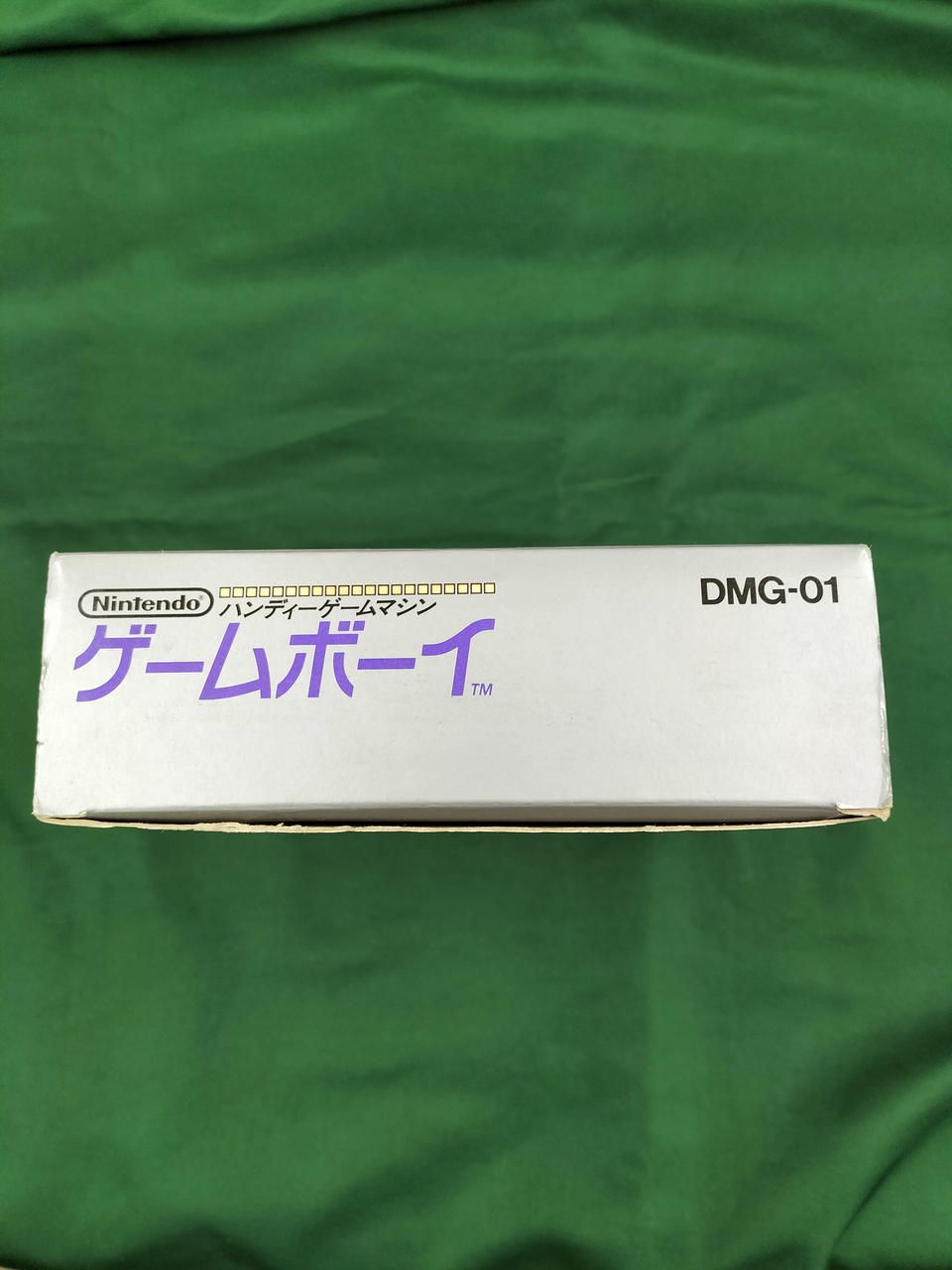 nintendo dmg-01 handheld console side view