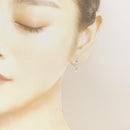 tasaki earrings side view